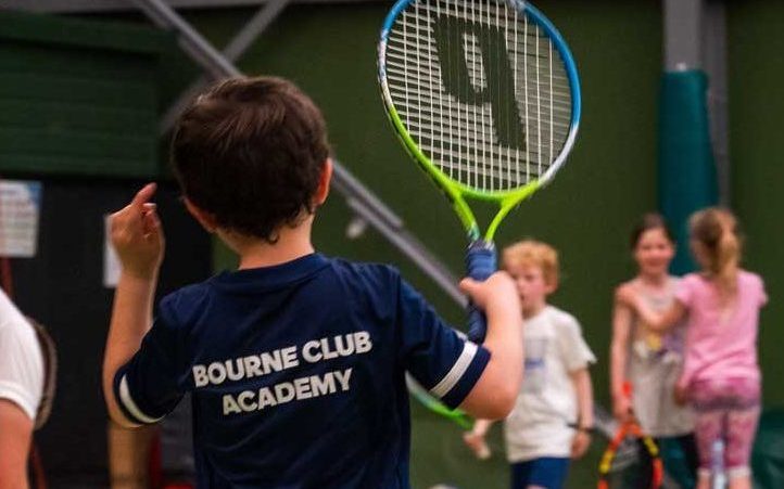 Kids practicing tennis